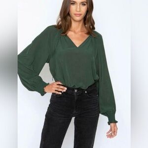 NWT- Boutique green V-neck body suit. Size Small.
